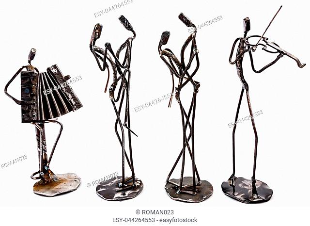 Figures of music performers made with welded black metal wire. Accordion and violin are playing together. Dancers are dancing stylish with sexy passion