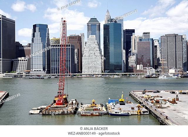USA, New York City, View of harbour with city