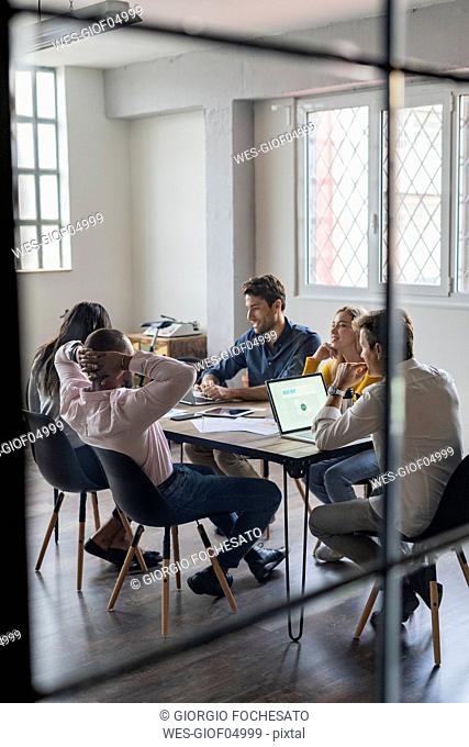 Business team having a meeting in loft office
