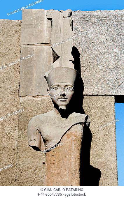 Karnak, Luxor, Egypt. Temple of Karnak sacred to god Amon: a statue of the pharaoh Nebkheprura Tutankhamon