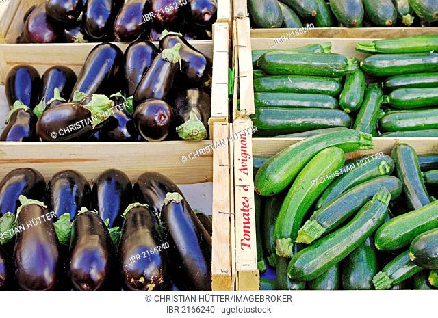 Market stall with Eggplants or Aubergine (Solanum melongena) and Zucchini (Cucurbita pepo subsp. Pepo convar. giromontiina), Sault, Vaucluse
