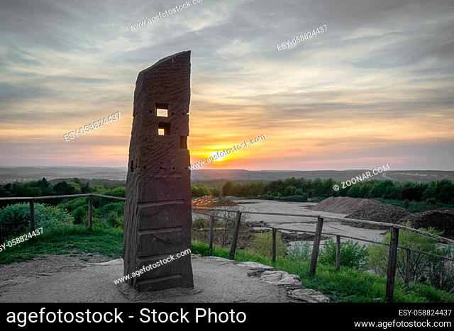 Pillar on top of hill at sunset Germany