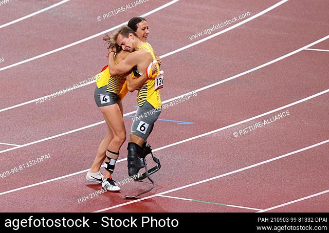 dpatop - 03 September 2021, Japan, Tokio: Paralympics: Athletics, men's 400 metres, T62 final, at the Olympic Stadium. Johannes Floors from Germany is happy...