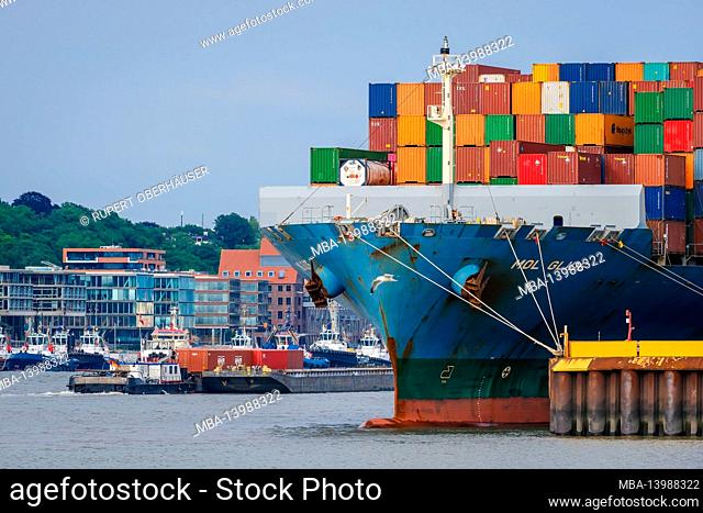 Hamburg, Germany - Container ship in the Port of Hamburg, the 275 meter long container ship Mol Glide carries up to 5, 605 sea containers