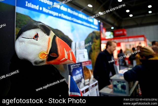 22 November 2023, Saxony, Leipzig: The model of a puffin stands at a stand for trips to Iceland at the ""Touristik & Caravaning International 2023"" trade fair
