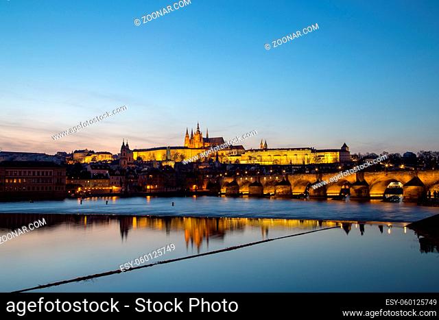 Prague, Czech Republic - March 15, 2017: Evening sunset view of Prague Castle and Charles Bridge