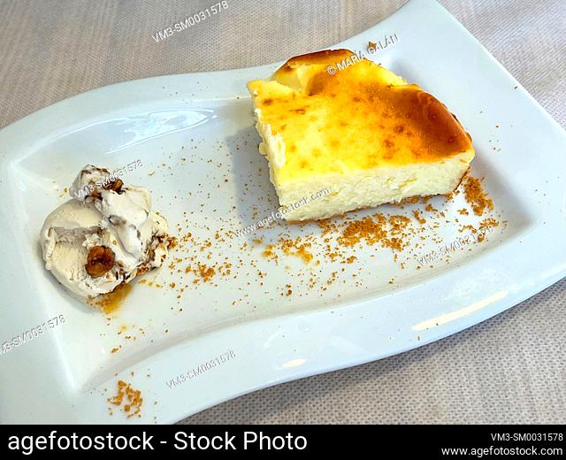 Cheese cake with ice cream. Spain