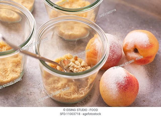 Biscuit crumbs and sugared apricots