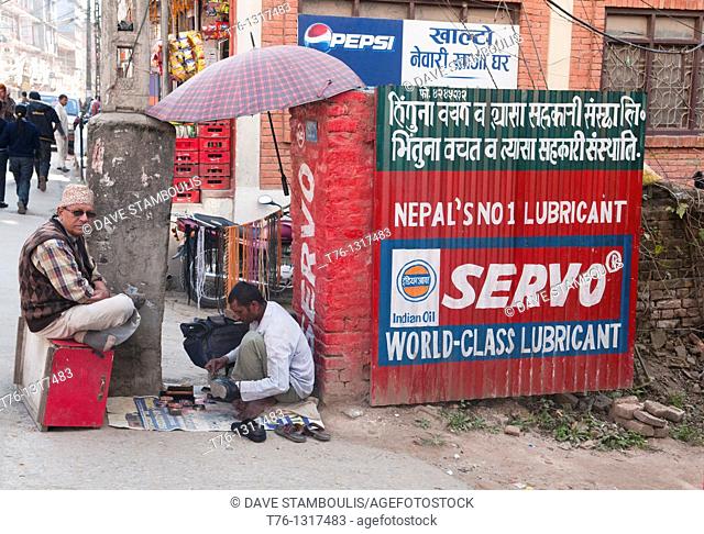 shoeshine service on the streets of Kathmandu, Nepal