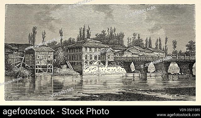 Srinagar bridge over the Jhelum river. Jammu & Kashmir, India. Trip to Punjab and Kashmir by Guillaume Lejean. Old engraving El Mundo en la Mano 1878