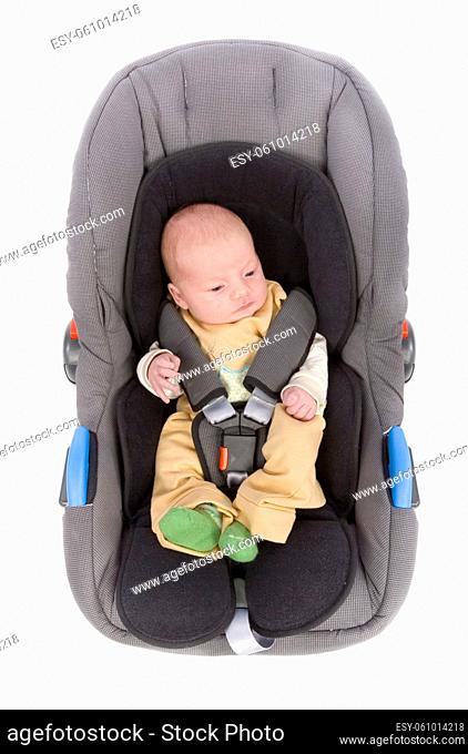newborn (3 weeks old) boy in the Child Car Seat