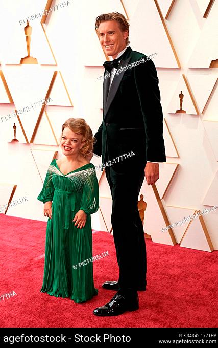 Anna Dzieduszycka and Oscar® nominee Tadeusz Lysiak arrives on the red carpet of the 94th Oscars® at the Dolby Theatre at the Ovation Hollywood in Los Angeles