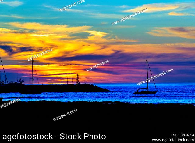 Mansa beach sunset silhouette scene at punta del este city, uruguay