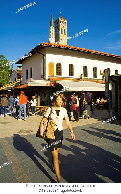Woman walking in Bascarsija district of Sarajevo Bosnia Herzegovina Europe