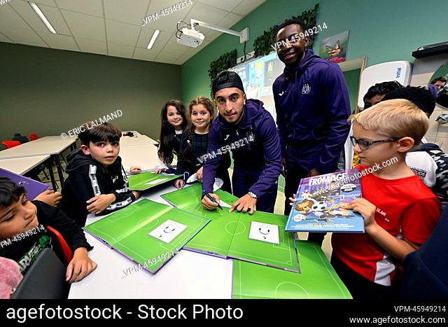 Anderlecht's Anouar Ait El-Hadj and Anderlecht's Marco Kana pictured during the presentation of the 'Fromage' children's book written by Belgian author...