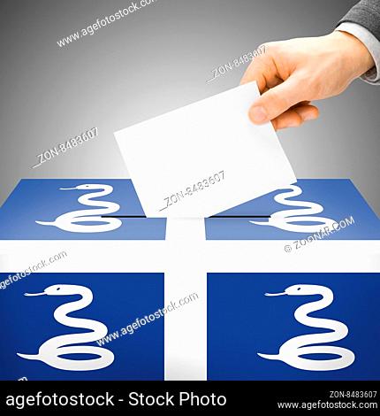 Voting concept - Ballot box painted into national flag colors - Martinique