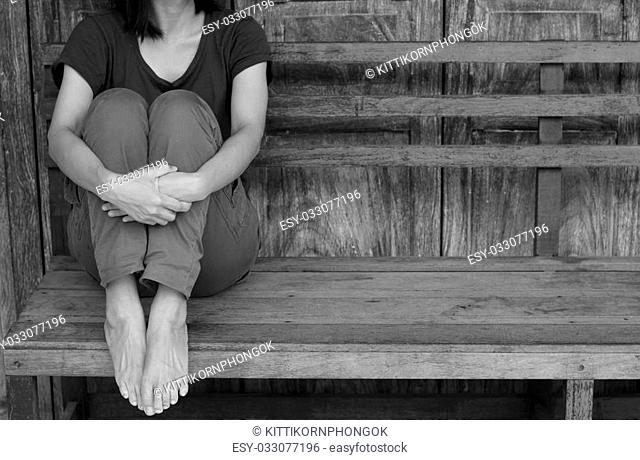 Asian woman waiting some on wooden wall background