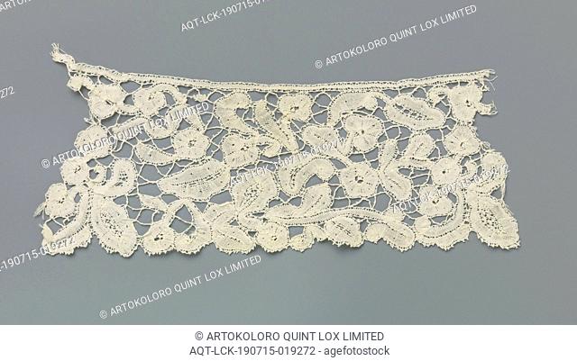 Strip of bobbin lace with simple flowers and leaves, Strip of natural-colored bobbin lace: duchesse lace. Simply designed flower and leaf motifs and volutes are...