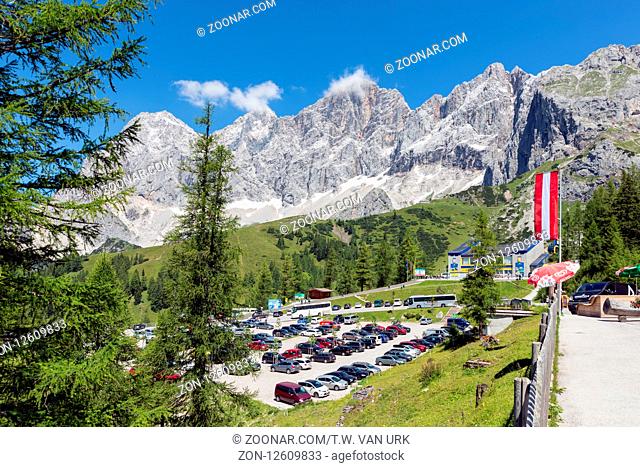 DACHSTEIN MOUNTAINS, AUSTRIA - JULY 17, 2017: Car park near the valley station of the Dachstein glacier cable car in Austria