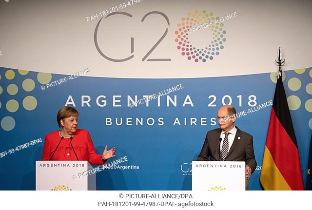 01 December 2018, Argentina, Buenos Aires: Federal Chancellor Angela Merkel (CDU) and Olaf Scholz (SPD), Federal Minister of Finance