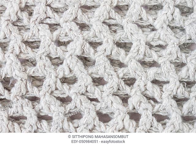 White Knitting Texture or Knitted Texture Background in macro style. Knitting Texture or Knitted Texture in vintage style for design