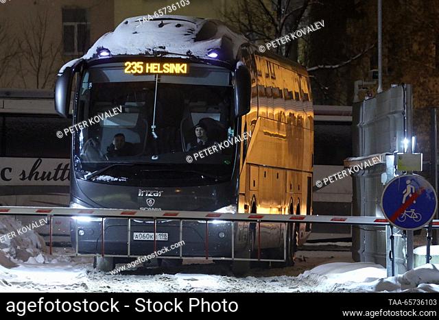 RUSSIA, ST PETERSBURG - DECEMBER 14, 2023: A Helsinki-bound bus operated by Ecolines leaves a bus station. Finland's government has announced it will re-open...