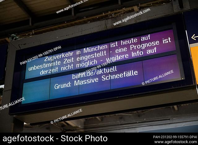02 December 2023, Bavaria, Munich: A sign at the main station indicates that train services in the greater Munich area have been suspended