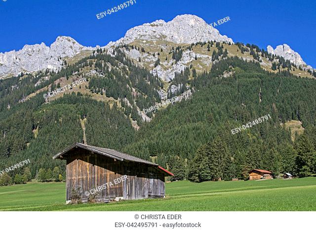 Hay hut in the Tannheim valley in front of the summits of the Tannheim mountains with Gimpel and Roter Fueh