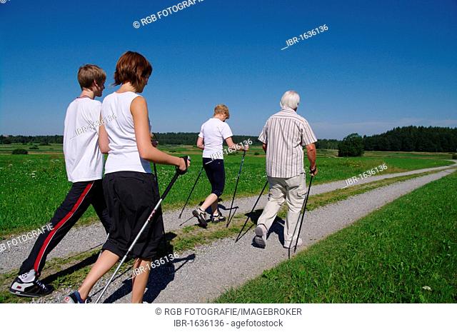 Young and old, Nordic Walking in the Allgaeu, Germany, Europe