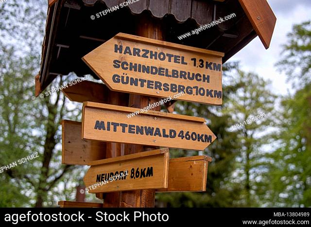 Germany, Saxony-Anhalt, Stolberg, signposts to the Harzhotel and to Mittenwald at the Josephskreuz on the Großer Auerberg in the Harz Mountains