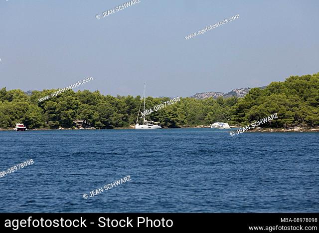 Entrance to Sibenik: between small forests covered with islands