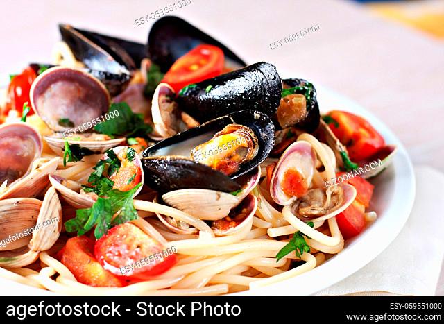 Mediterranean food. Seafood spaghetti with clams. High quality photo