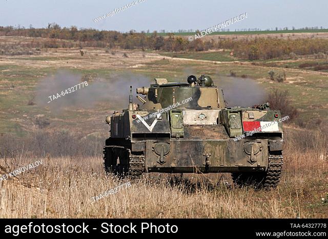 RUSSIA, ZAPOROZHYE REGION - OCTOBER 31, 2023: A BMD-2 amphibious infantry fighting vehicle during a combat mission by Russian Army Novorossiysk mountain air...