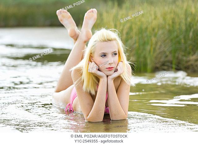 Teen girl in shallow water