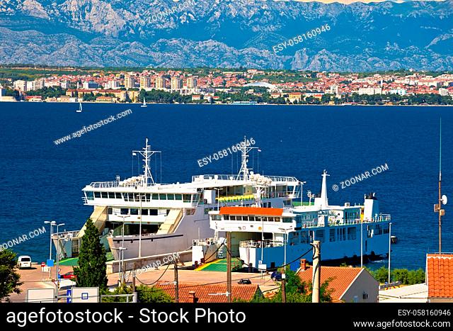 Island of Ugljan ferry port and Zadar view with Velebit mountain background, archipelago of Dalmatia, Croatia