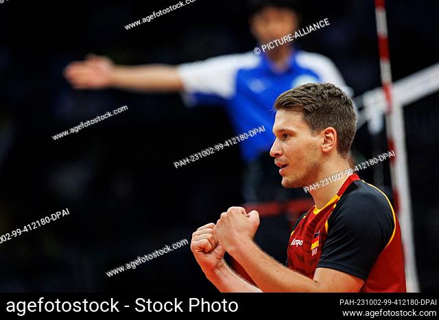 01 October 2023, Brazil, Rio de Janeiro: Volleyball, men: Olympic qualification, Group A, Cuba - Germany. Germany's Johannes Tille cheers