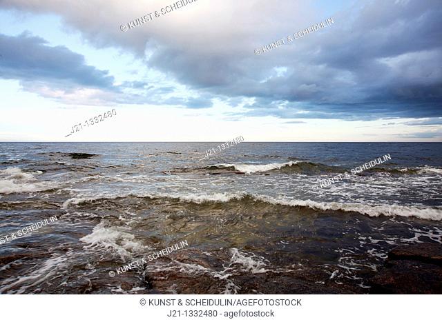 Waves splashing against rocks on the coast of the Baltic sea