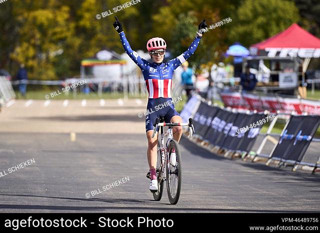 US Clara Honsinger celebrates as she crosses the finish line to win the men race at the Trek CXC Cup, a cyclocross cycling race in Waterloo (WI), USA