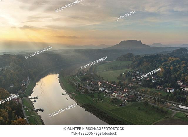 View from the spectacular rock formation Bastei (Bastion) in the national park Saxony Switzerland to the health resort Rathen near Dresden and to Elbe River