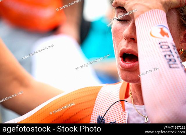 Dutch Demi Vollering of SD Worx looks tired after crossing the finish line at the elite women time trial race at the UCI World Championships Cycling, in Glasgow