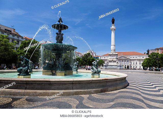 Fountain frames the old palace in Praça Dom Pedro IV also known as Rossio Square Pombaline Downtown of Lisbon Portugal Europe
