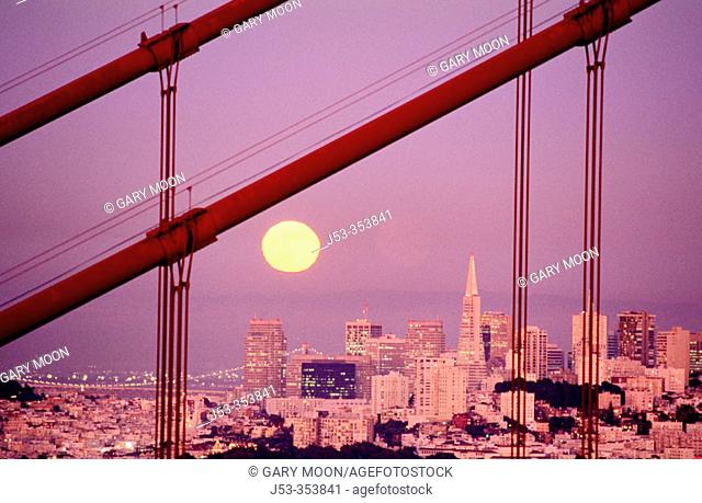 Moonrise, dusk at Golden Gate Bridge. San Francisco, California. USA