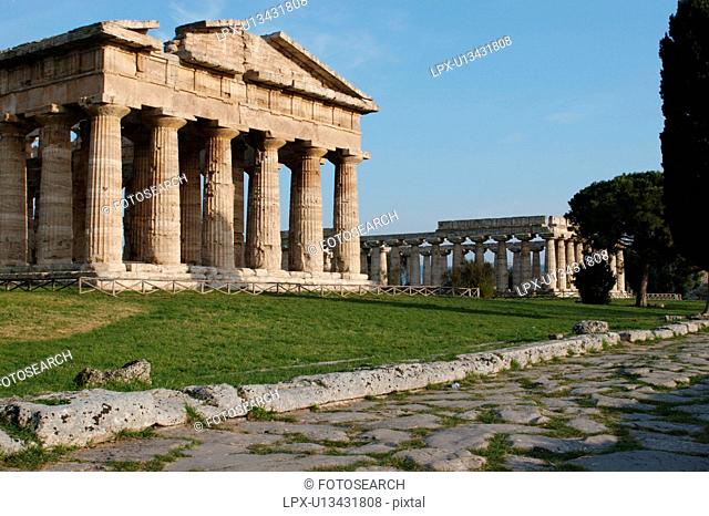 Greek Temples in Campania, Italy: Paestum - Roman road Cardus Maximus and Temple of Neptune Poseidon aka Temple of Hera II