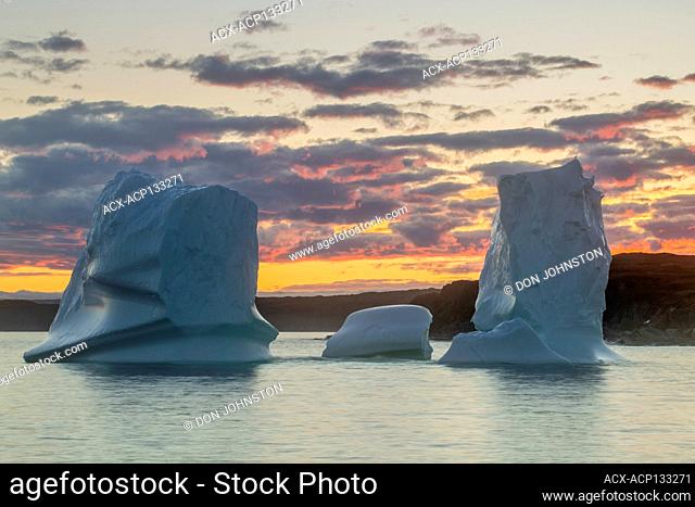 Grounded iceberg at sunset, Goose Cove, Newfoundland and Labrador NL, Canada