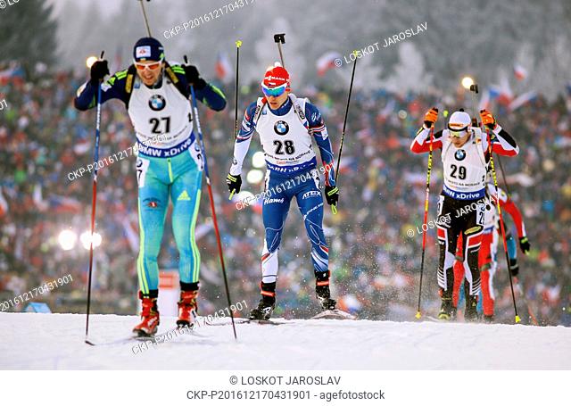 From left: Vitaliy Kilchytskyy of Ukraine, Michal Krcmar of Czech Republic and David Komatz of Austria compete in the World Biathlon Cup men's pursuit race in...