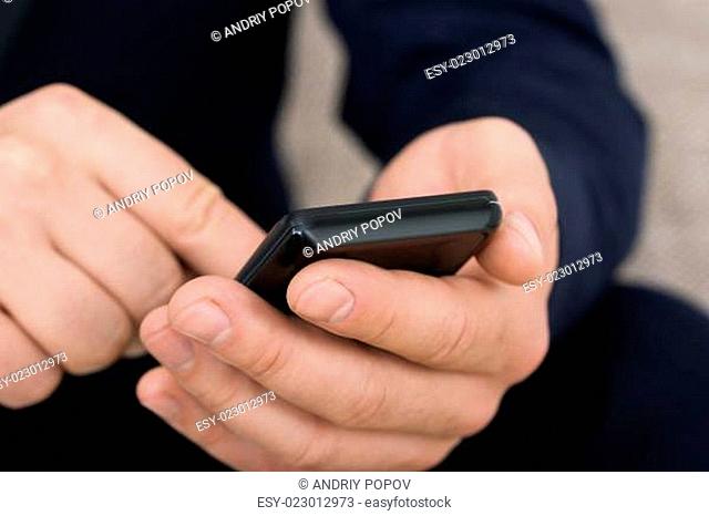 Close-up Of A Person Holding Mobile Phone