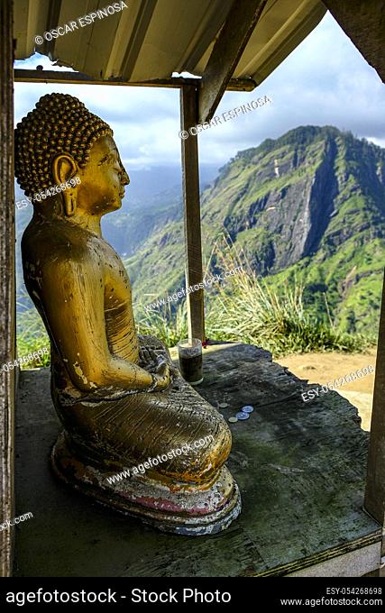 Buddha statue in the Little Adamâ. . s Peak in Ella, Sri Lanka