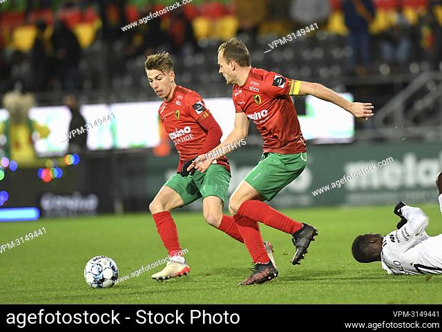 Oostende's Nick Batzner and Oostende's Brecht Capon pictured in action during a soccer match between KV Oostende and KAS Eupen