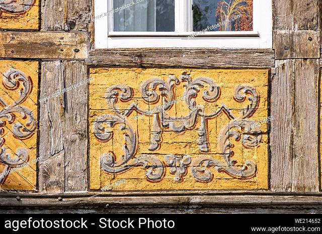 Quedlinburg, Saxony-Anhalt, Germany: Frames with painted ornaments on one of the half-timbered houses typical of the World Heritage Town at Schlossberg