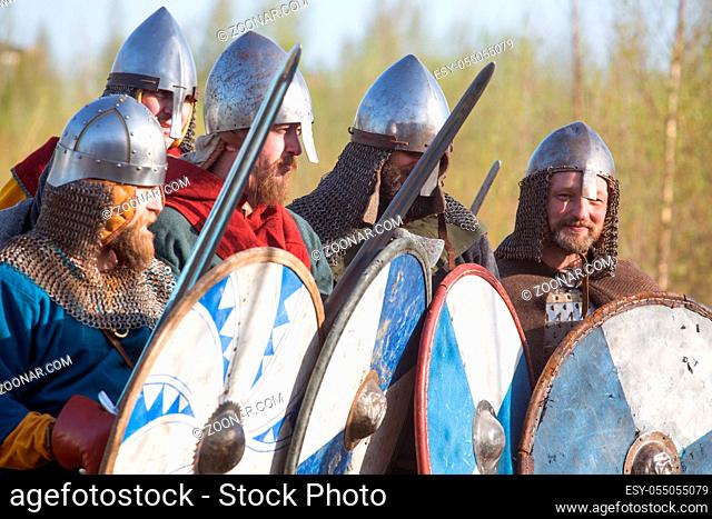 Group of slav warriors in reenactment battle rehearsal training